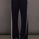 Model is wearing Velour High-Waisted Wide-Leg Pant in Polka Dot, front view.