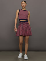 Model wears a red and blue patterned cropped tennis tank.