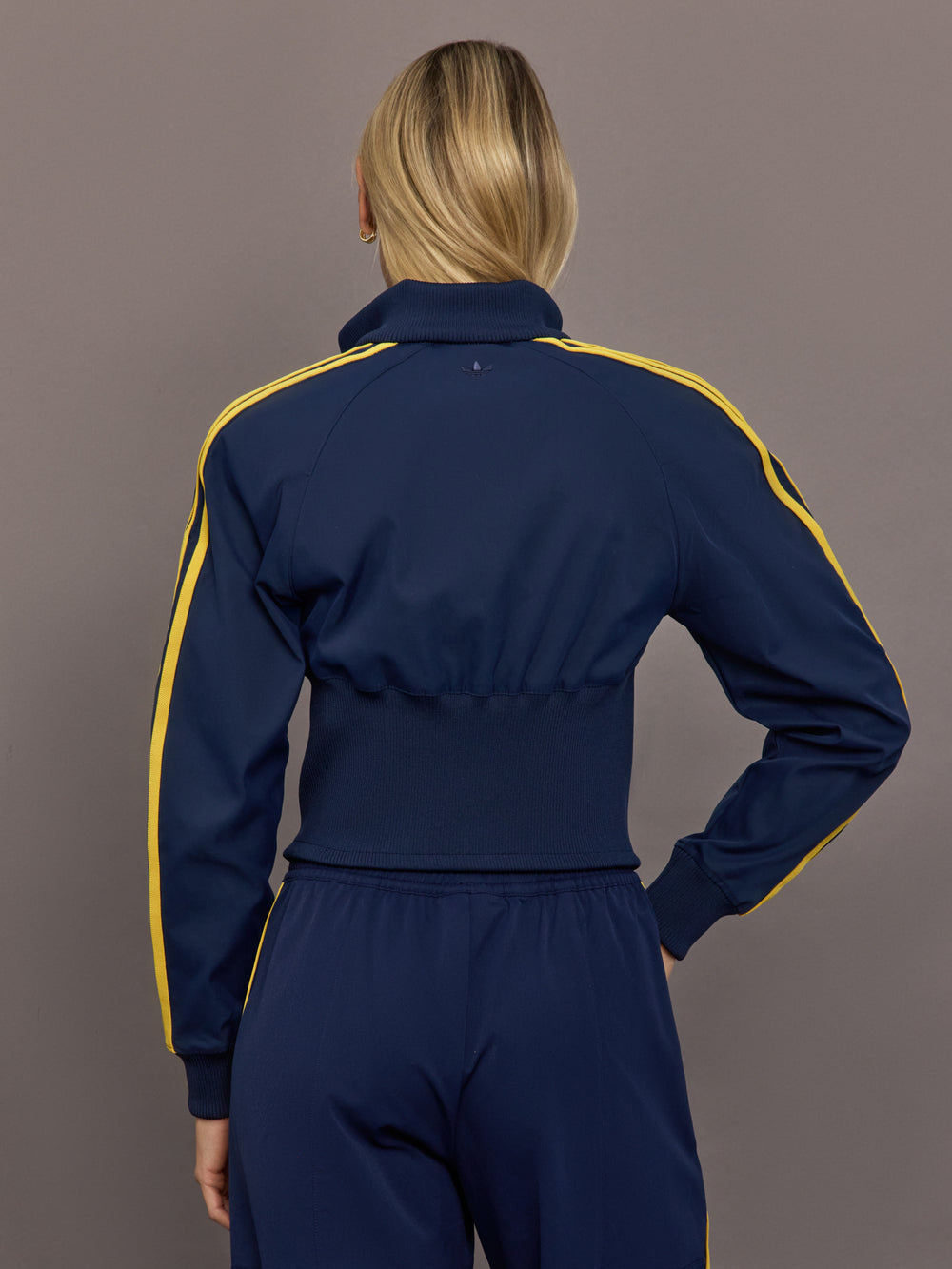 Back view of the Miaou tracktop in collegiate navy showing ribbed hem detailing and a clean athletic finish.