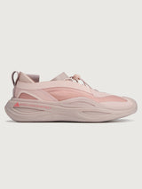 Sneakers in pink color with a biobased cage upper and lace-up closure.