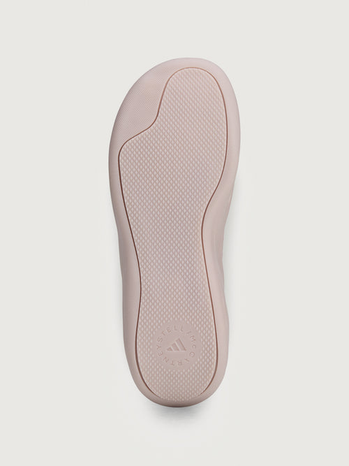 Sneakers in pink color with a biobased cage upper and lace-up closure.