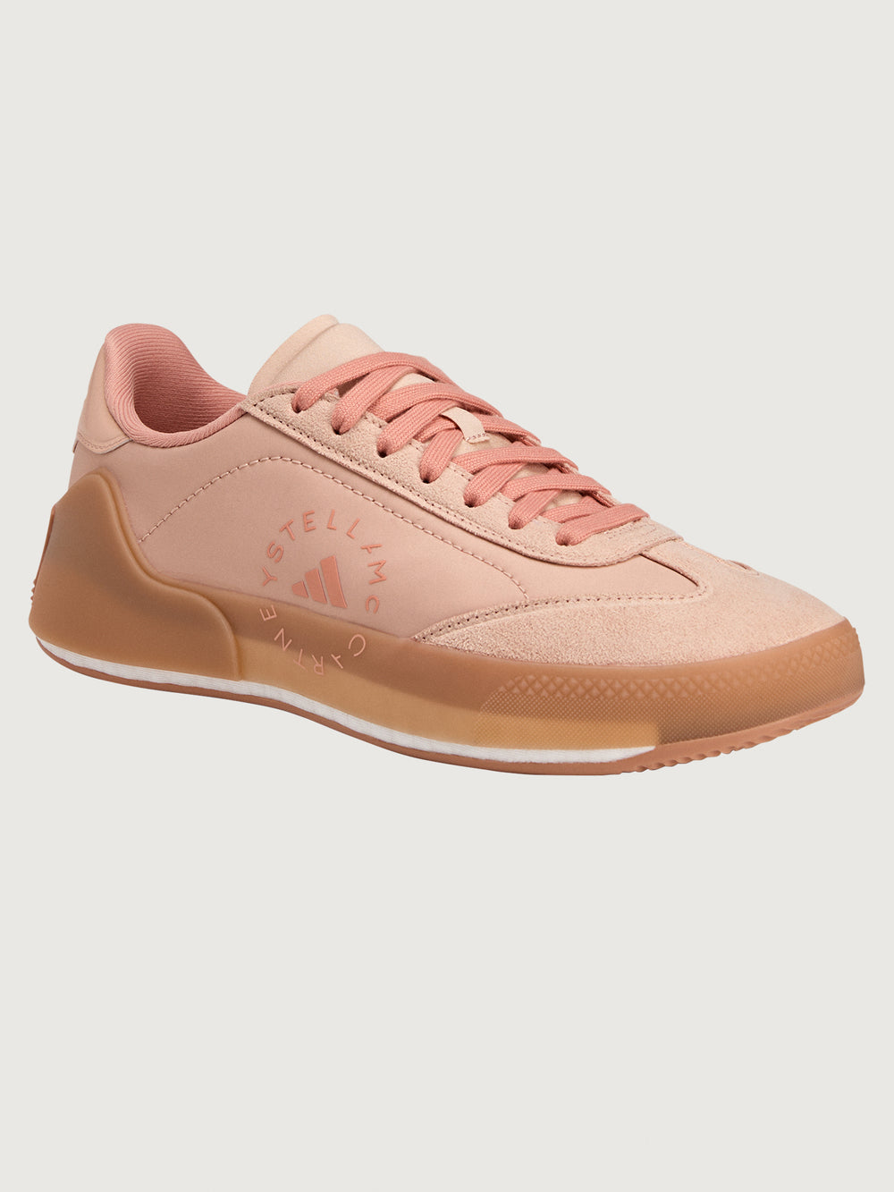 Court Boost Performance Tennis Shoe in Soft Powder, angled front view.