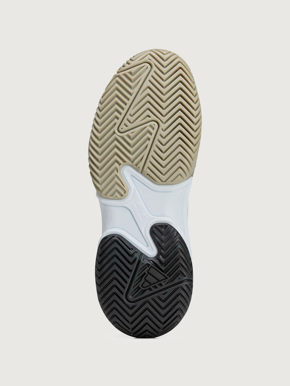 Close-up of a shoe sole with a textured pattern on a light gray background