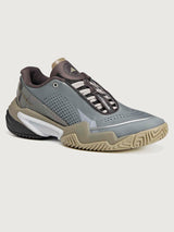 Gray and brown athletic shoe on a light gray background