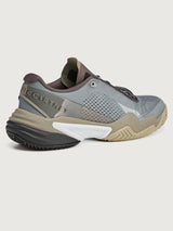 Gray and brown sneaker with visible branding on a light gray background