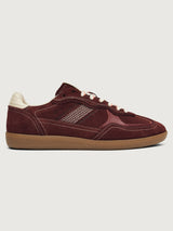 Burgundy sneakers with beige accents.