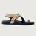 Taupe suede sandal with black sole and gold hardware. 