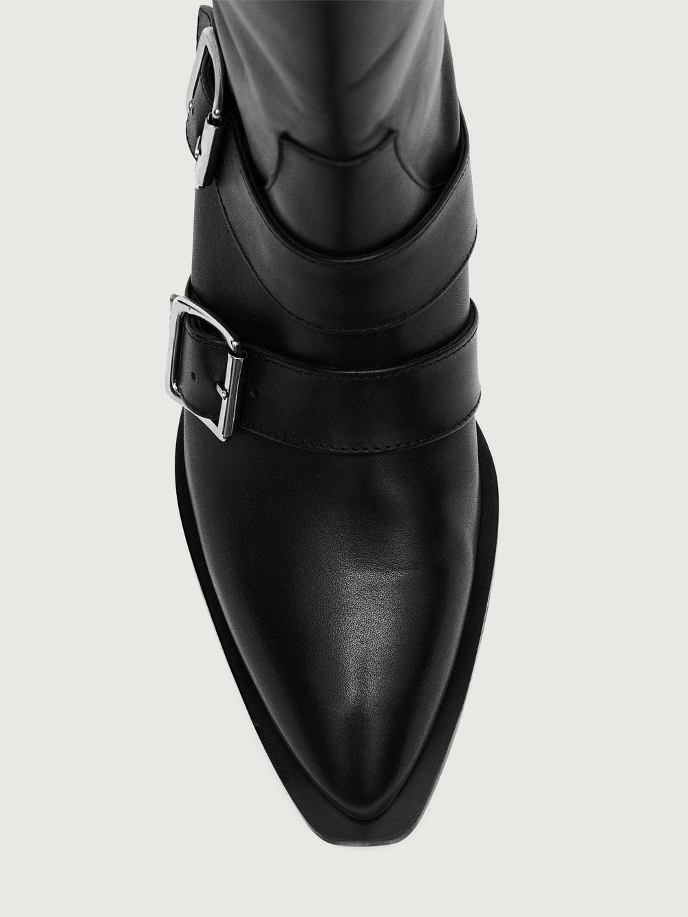 Black knee-high boot with silver buckles.