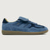 Denim blue suede low top lifestyle sneaker with navy heel detailing. 