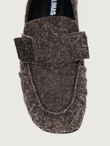 Brown suede loafer shoe.