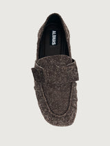 Brown suede loafer shoe.