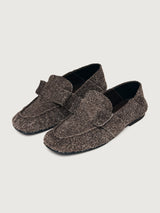 Brown suede loafer shoe.