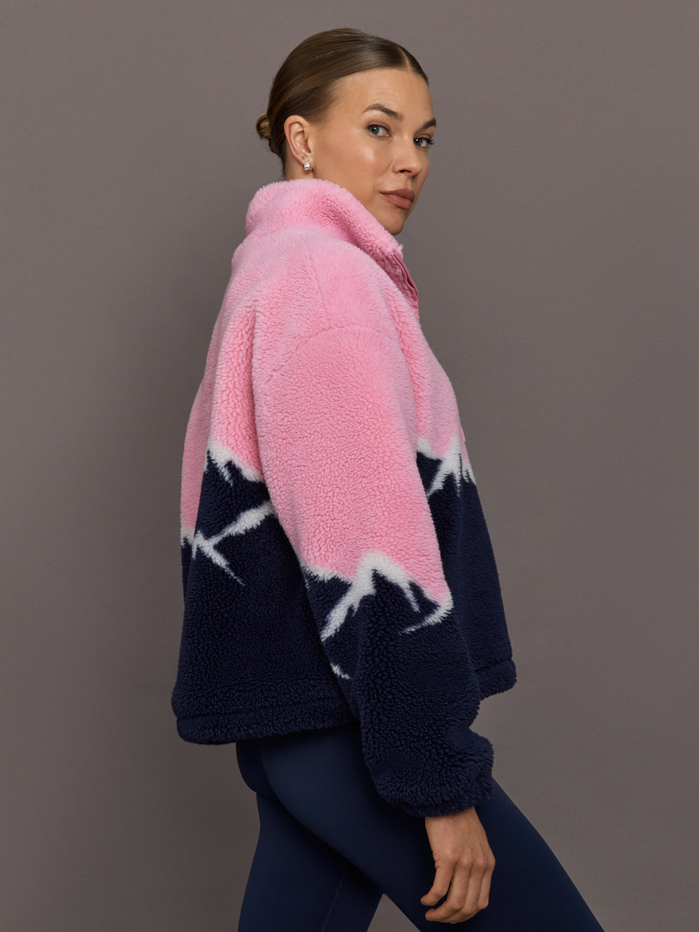 Side view of Lenoa Sherpa Top in Snowy Peaks highlighting relaxed fit and sherpa texture.