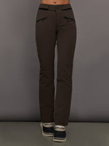 Brown pants worn by a person on a gray background