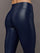 Model wears liquid takara shine leggings in regular rise with a thick waistband in navy.
