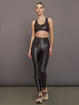 Model wearing High Rise 7/8 Legging in Takara Shine in Chocolate Torte styled with matching Action Bra.
