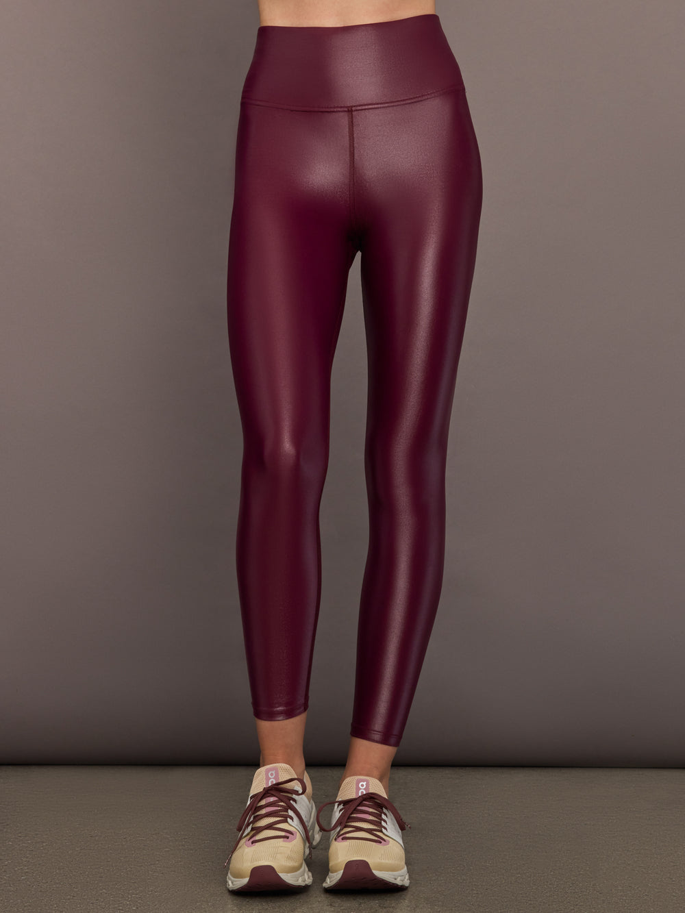 Front view of model wearing High Rise 7/8 Legging in Takara Shine in Fig with sculpting high-rise waistband.