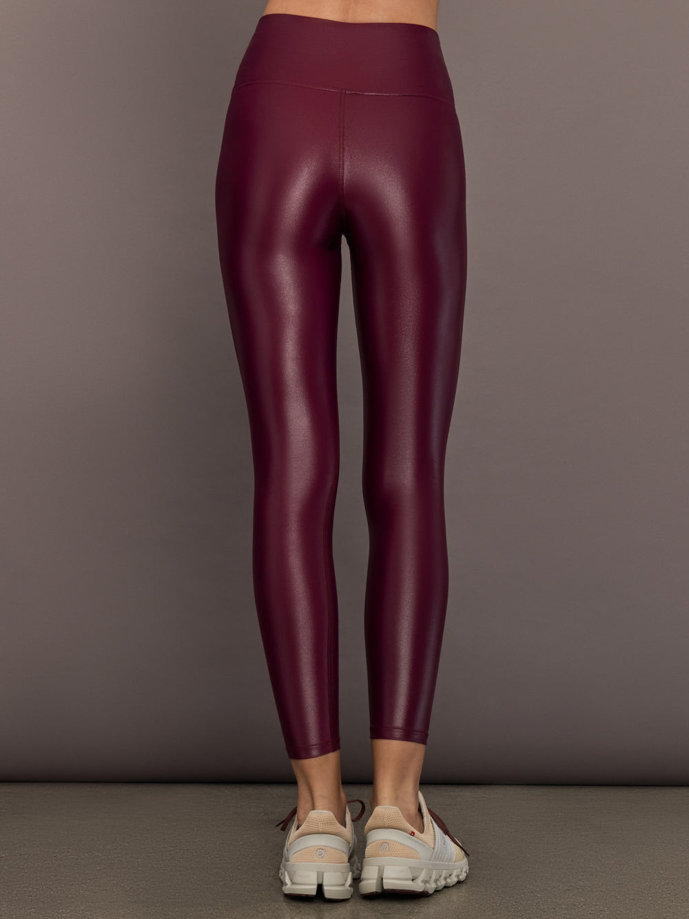 Back view of High Rise 7/8 Legging in Takara Shine in Fig showing second-skin fit and smooth shine texture.