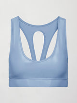 Flat lay of the Action Bra 2.0 in Takara Shine in Serenity showing racerback cutout construction.
