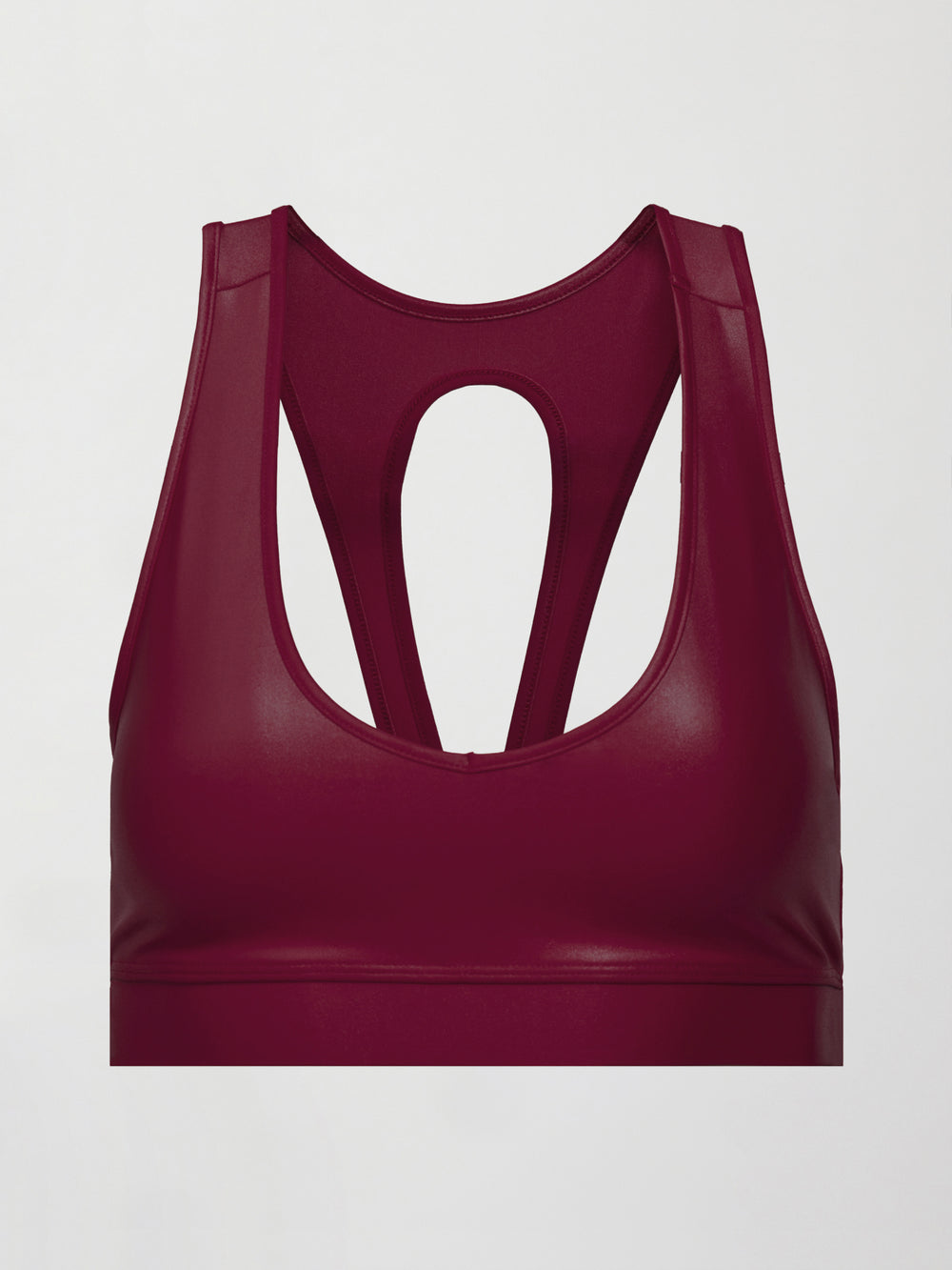 Flat lay of Action Bra 2.0 in Takara Shine in Fig with scoop neckline, racerback design, and smooth shine finish.