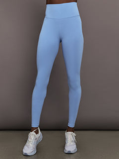 Model is wearing High Rise Full-Length Legging in Diamond Compression Serenity, front view.