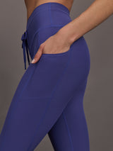 Close up of side pocket and waistband on Melt High Rise Sport Pocket Legging in Future Dusk.