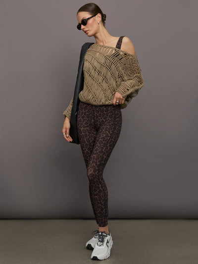 Full outfit styled with Melt High-Rise Sport Pocket Leopard Print Legging and oversized knit sweater.