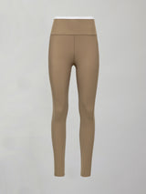 Model wears a buttery soft high waisted chinchilla legging with thin white waistband. 