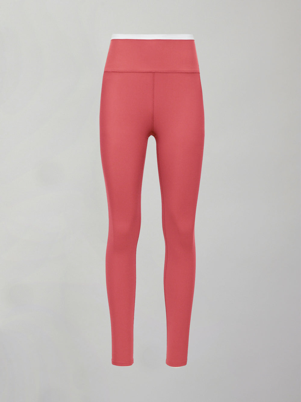 Model wears a buttery soft high waisted rosewood legging with thin white waistband. 