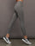 Side view of Ribbed Melt High Rise Legging in Steel Grey on model.