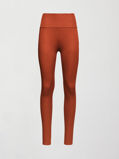 Flat lay of ribbed terracotta high-rise leggings, front view.