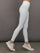 White ribbed high-rise leggings on model, side walking view.