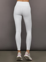 White ribbed high-rise leggings, back view on model.