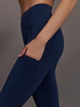 Close-up of pocket detail on Diamond Compression High Rise Pocket Legging Navy.