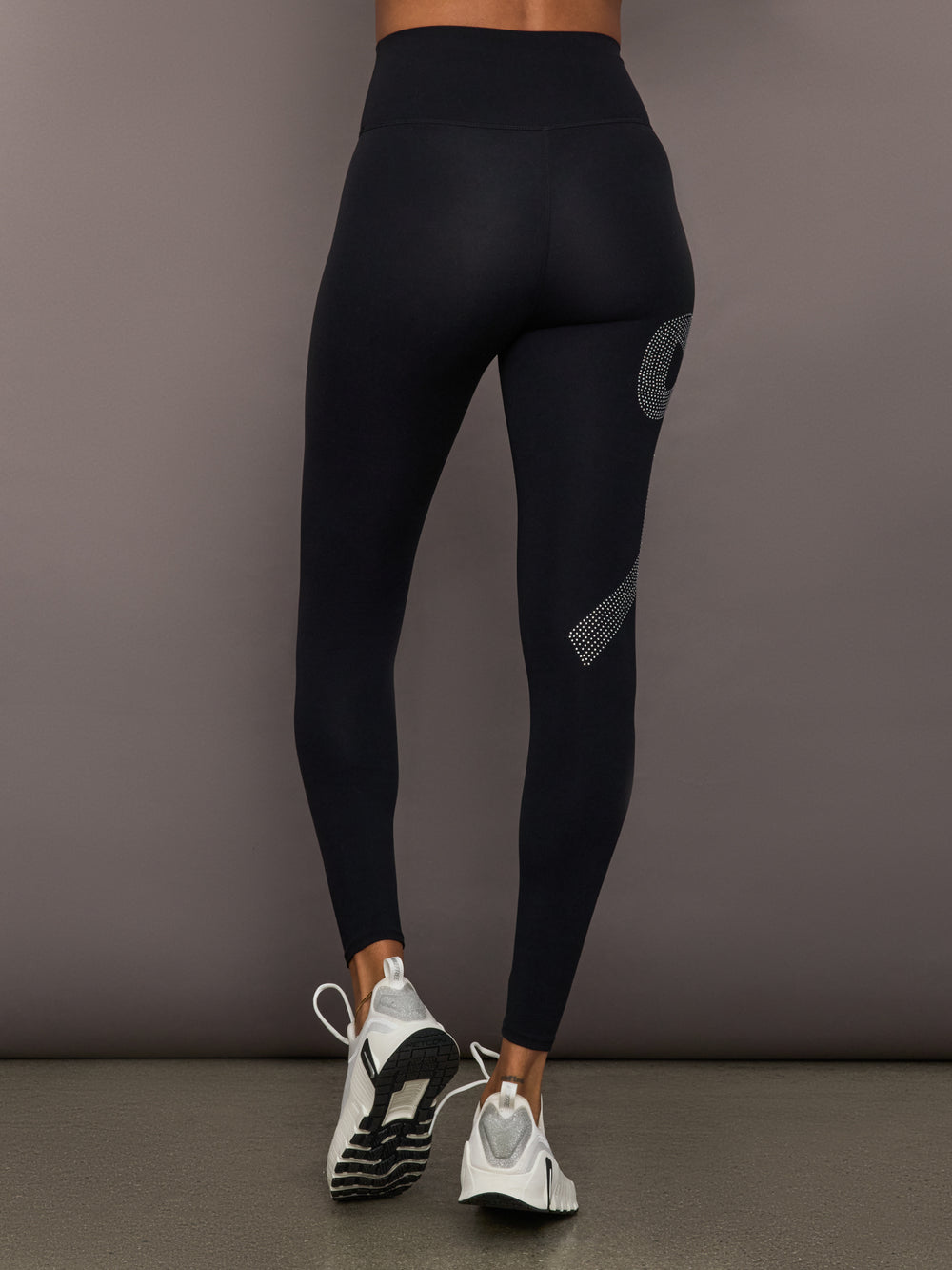 Back view of Rhinestone Bow Legging in Melt Black with rhinestone bow design on leg.