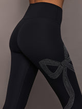 Close-up of Rhinestone Bow Legging in Melt Black showing rhinestone bow embellishment.