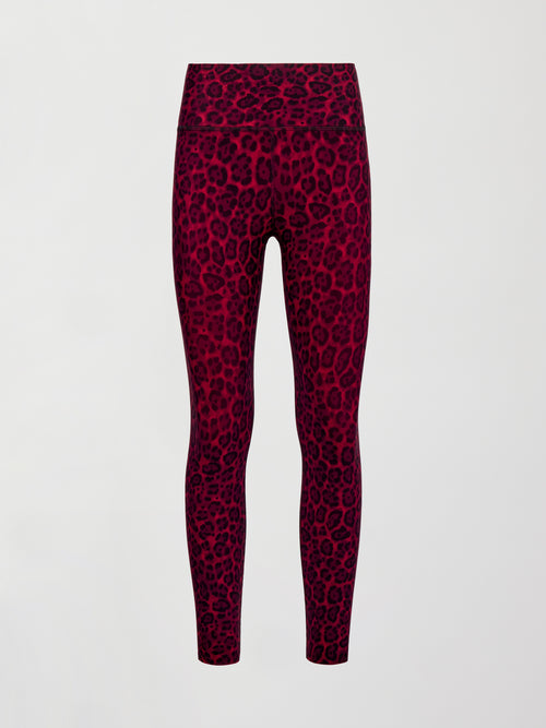 High-rise red leopard Melt leggings displayed on white background.