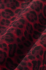 Close-up of Melt fabric in red leopard print, textured detail.