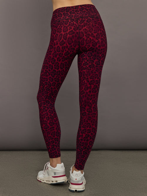 High-rise Melt leggings in red leopard print highlighting sculpted back fit.