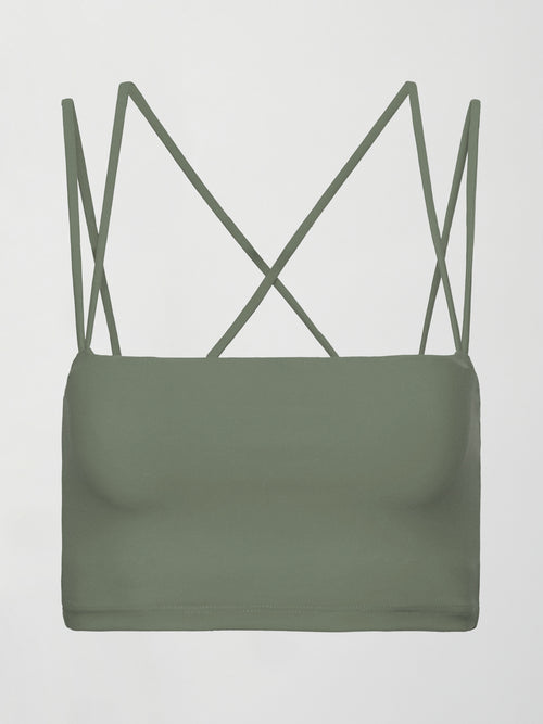 A buttery soft sports bra in army green with double straps and cross back design. 