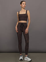 Full outfit styled with Melt Square Neck Bra Leopard Print and leggings front view.