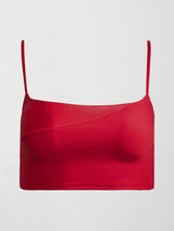 Image of a cropped red tank with spaghetti straps with a shiny takara overlay in the top right.