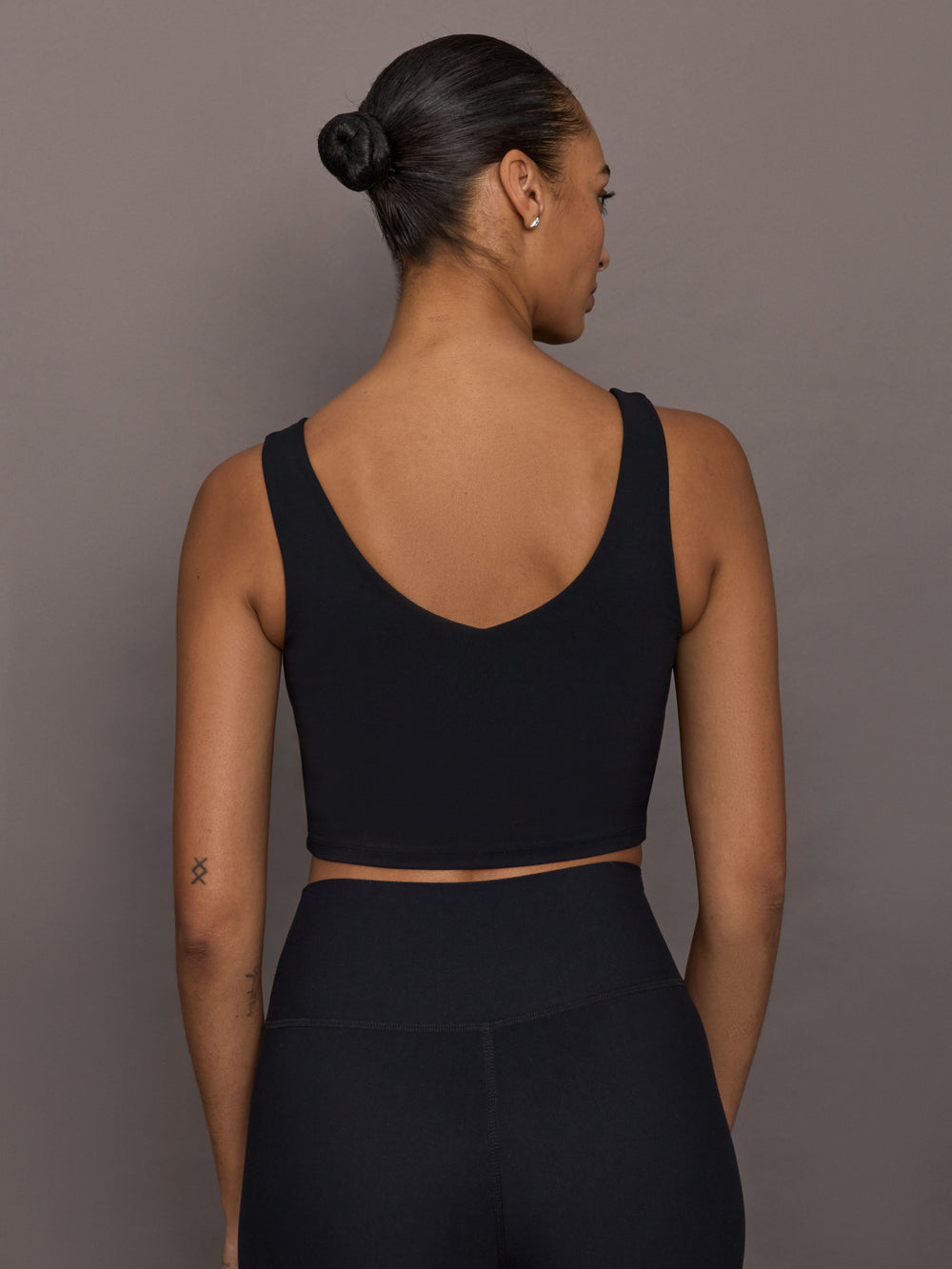 Back view of Rhinestone Bow Bra in Melt Black with scoop back and wide straps.