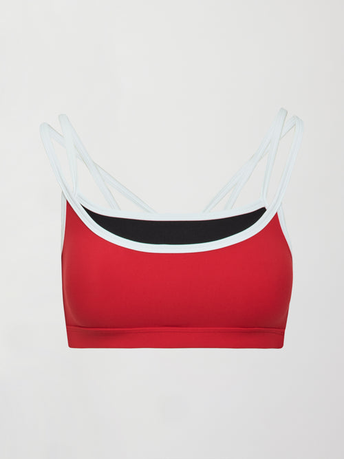 Flat lay of Melt Double Layered Sports Bra in Black, Crimson, and White Binding, front view.