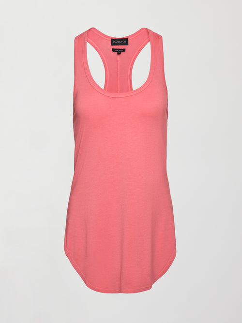 Model wears long racerback rosewood colored tank top with a loose fit and scoop neckline.