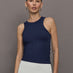 Model wears a lightweight navy high neck ribbed tank. 