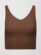 Flat lay of cocoa brown ribbed melt v-neck cropped tank top, women’s activewear tank with ribbed texture.
