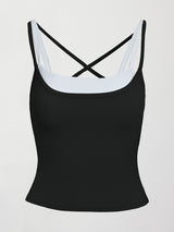 Model wears double-layered melt tank with black outer body and white inner layer.