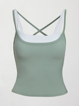 Model wears double-layered melt tank with sage outer body and white inner layer.