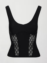 Black tank top with laser cutout paneling along riblines bilaterally. 